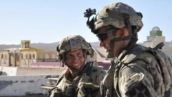 Sergeant Robert Bales (left) during an exercise at the National Training Center in Fort Irwin, California, in August 2011