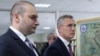 Georgian Prime Minister Mamuka Bakhtadze (left) and NATO Secretary-General Jens Stoltenberg at the Krtsanisi National Training Center outside Tbilisi on March 25