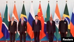 BRICS Leaders (from left) Brazilian President Michel Temer, Russian President Vladimir Putin, Chinese President Xi Jinping, South Africa's President Jacob Zuma, Indian Prime Minister Narendra Modi in a group photo during the BRICS Summit at the Xiamen International Conference and Exhibition Center in Xiamen, southeastern China's Fujian Province on September 4.