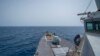 FILE - The Arleigh Burke-class guided-missile destroyer USS Bainbridge (DDG 96) sails in the Gulf of Oman, June 20, 2019