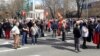 Several hundred protesters rallied against the law outside parliament, but the demonstration passed without incident.