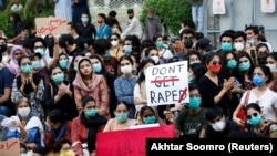 People protest in Karachi in September 2020 to condemn violence against women and girls after a gang rape that occurred along a highway.