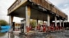 A gas station shows damages after it was attacked and burned during protests over rises in government-set gasoline prices, in Tehran, Iran, Wednesday, Nov. 20, 2019. FILE PHOTO