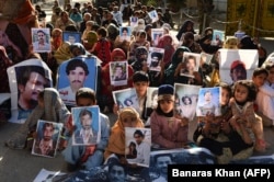 Families of Baloch victims of alleged enforced disappearances inside their protest camp in Quetta, Balochistan.