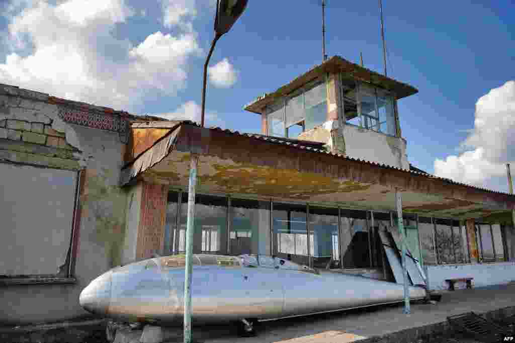 A glider sits at an abandoned airport in Ceadir-Lunga, in Moldova&#39;s Gagauzia region.