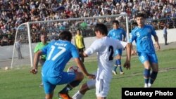 Tajikistan -- Football teams Ravshan and Istiklol, 