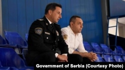 Veselin Mlić (L) sa tadašnjim ministrom unutrašnjih poslova Aleksandom Vulinom na košarkaškoj utakmici policijskih timova u sportskom centru "Šumice" u Beogradu, 21. jun 2021.