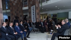 Armenia - Presidential candidate Armen Sarkissian (R) meets with IT executives at the Yerevan headquarters of Synopsis Armenia company, 14 February 2018.