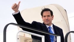 US Secretary of State Marco Rubio gives a thumbs up as he departs from Bratislava, Slovakia, on February 15.