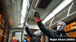 Disinfecting buses in Tehran to counter the outbreak of coronavirus on Friday, February 21, 2020.