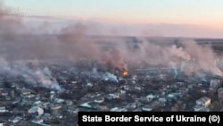 Разрушенные российскими артобстрелами жилые кварталы в южно-западной части Бахмута, апрель 2023 года