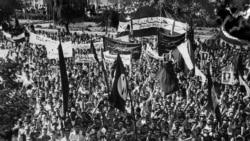 National Front of Iran (Jebhe Melli) supporters demonstrate, in Tehran, July 25, 1953 in support of Prime Minister Mohammad Mossadegh.