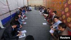 Protest organizers from Hazara community attend a gathering a day before a planned demonstration in Kabul on May 15.