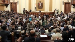 The defiant parliament meets in Cairo on July 10.