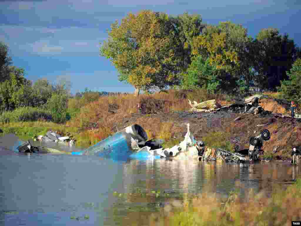 The crash site of a Yak-42 jet near the city of Yaroslavl, on the Volga River, on September 7, which killed nearly the entire Lokomotiv Yaroslavl hockey team. (Photo by Vladimir Smirnov for ITAR-TASS)