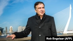 Former Georgian President Mikheil Saakashvili poses in front of the Erasmus Bridge in Rotterdam. (file photo)