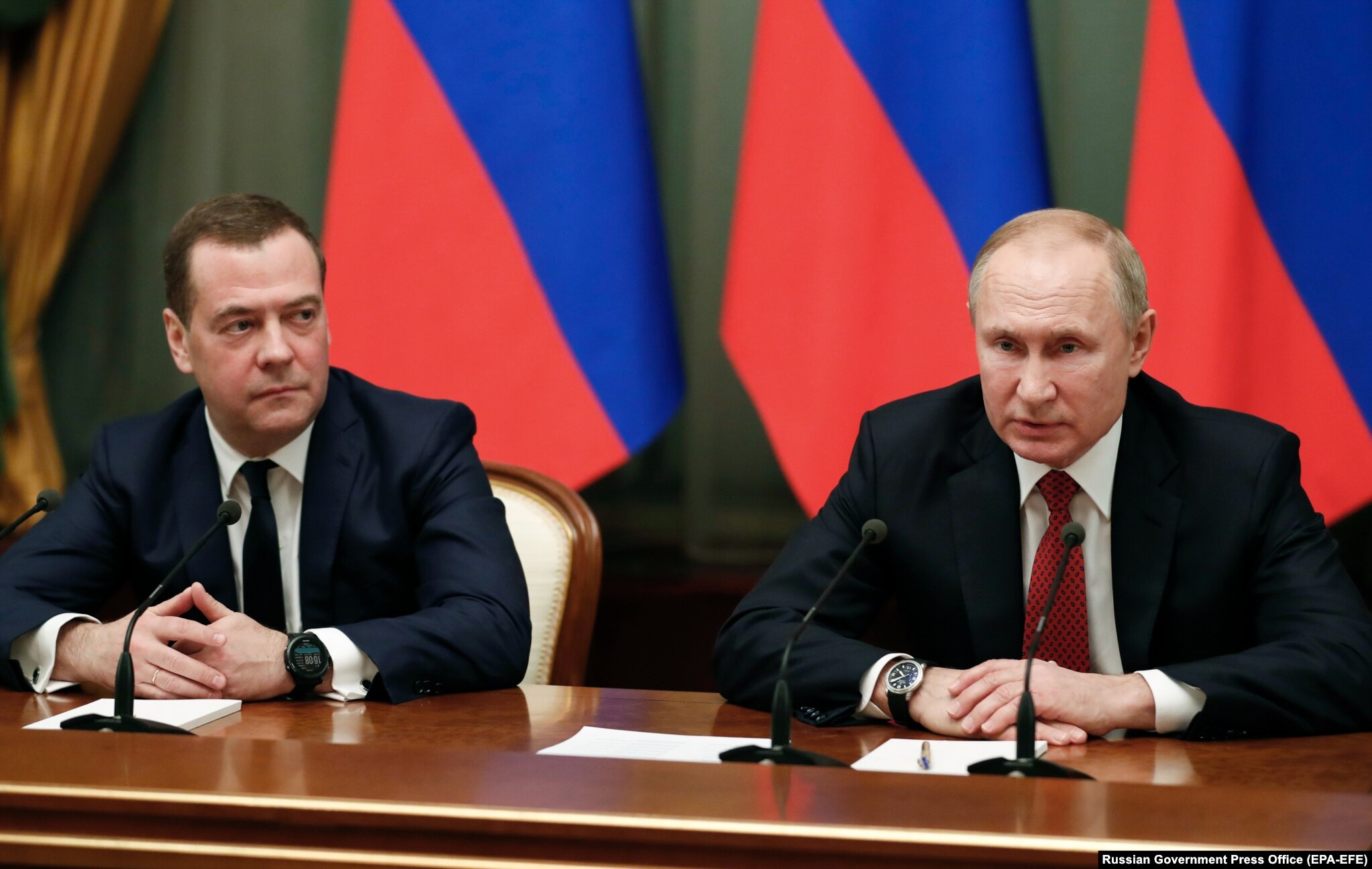 Putin and Medvedev meet with members of the government in Moscow on January 15, 2020. Putin used his annual state-of-the-nation speech to call for a referendum on substantial constitutional amendments that would strengthen parliament's powers before his term ends in 2024. Hours later, Medvedev and his cabinet resigned.