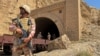 Pakistan army soldiers stand at a tunnel where the Jaffar Express train was attacked by separatist militants, in Bolan, Balochistan, Pakistan, March 15, 2025