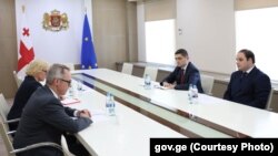 პეტერ ფიშერისა და ლევან ჟორჟოლიანის შეხვედრა