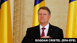 ROMANIA -- Romania's President Klaus Iohannis listens to the national anthem at Cotroceni Presidential palace in Bucharest, Romania, 04 January 2017