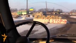 Battling The Cold At East Ukraine Checkpoint