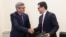 Armenia - Indian Defense Secretary Rajesh Kumar Singh (left) and Armenian Defense Industry Committee head Aram Jivanian sign an agreement in Yerevan, August 17, 2026.