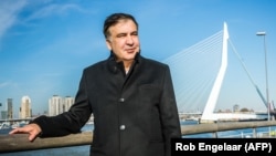 Former Georgian President Mikheil Saakashvili poses in front of the Erasmus Bridge in Rotterdam. (file photo)