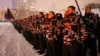 Volunteers of the right-wing paramilitary Azov Civil Corps swear an oath of allegiance in central Kyiv on January 28.