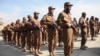 NATO Suspends Afghan Training
