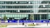 Poster "Bulgaria, welcome to the Euro" is seen in Brussels near the European comission