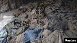 The mass grave on the outskirts of Mazar-e Sharif contains at least 10 human skulls.