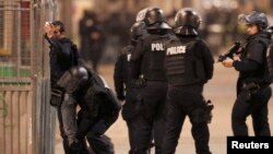 Французька поліція під час операції, 18 листопада 2015 року