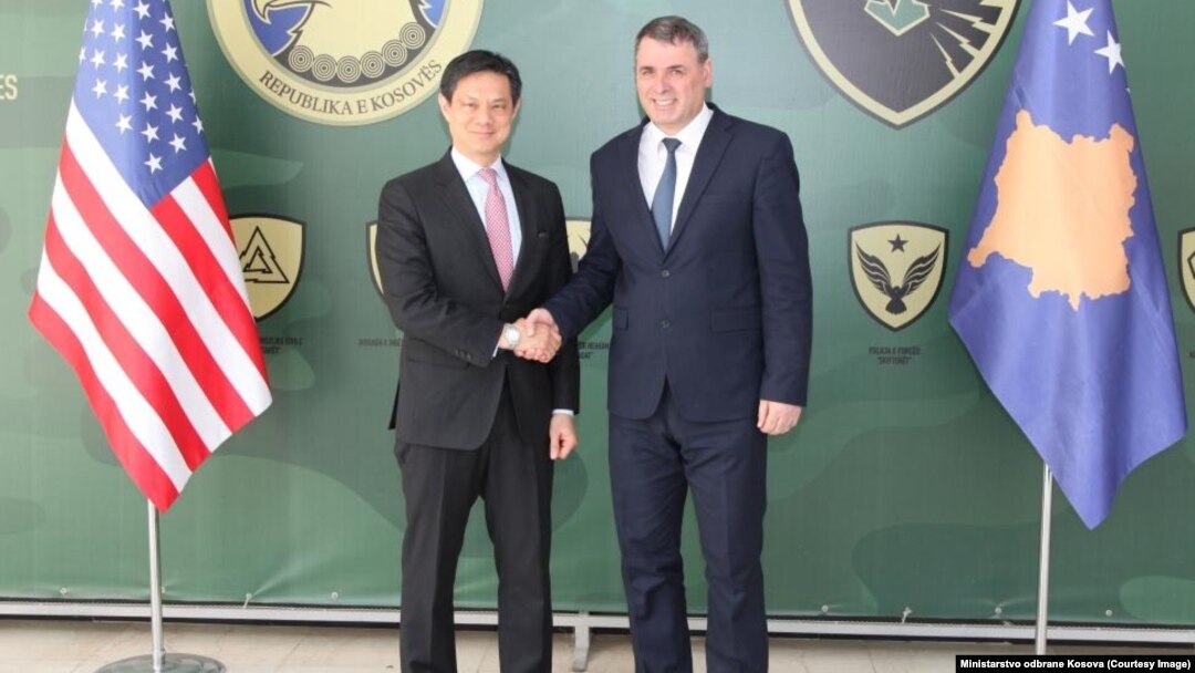 Deputy U.S. Assistant Secretary of State Hoyt Brian Yee (left) and the minister for Kosovo's security forces, Haki Demolli, in Pristina on March 29