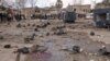 На месцы аднаго з выбухаў у Алепа, 10 лютага 2012 году