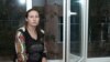 Kazakhstan - Oksana Shevchuk, suspected of “participating” in the activities of a banned organization, on a window sill during a break in a court session. Almaty, 03Jul2019.