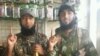 Воюющие в Сирии на стороне исламистских группировок мужчины, предположительно выходцы из Таджикистана. Фото из социальных сетей. 