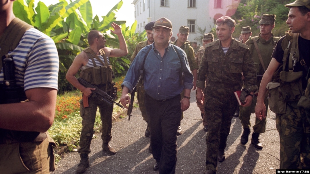 Tengiz Kitovani (center) is seen in the city streets following heavy fighting in Georgia's breakaway region of Abkhazia in 1992.