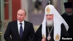 Patriarch Kirill (right) is a close ally of Russian President Vladimir Putin, whose rule he once famously likened to "a miracle of God."