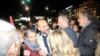 Members of Serbian opposition parties and their supporters protest in Belgrade (Serbian politician Sasa Jankovic, center) on October 6.