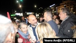 Members of Serbian opposition parties and their supporters protest in Belgrade (Serbian politician Sasa Jankovic, center) on October 6.