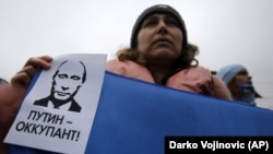 Під час мітингу проти окупації Росією українського Криму. Сімферополь, 11 березня 2014 року