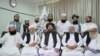 Mullah Abdul Ghani Baradar (center, sitting) will be a key deputy of the head of the new Taliban government.