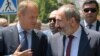 Armenia-- Armenian Prime Minister Nikol Pashinian and European Council President Donald Tusk walk in downtown Yerevan after their meeting on July 10, 2019. 