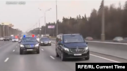 Patriarch Kirill drives on Moscow's ring road with a police escort on April 3.