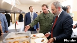 Armenia -- Prime Minister Nikol Pashinian and Defense Minister Davit Tonoyan (second from right) inspect the new canteen of a military base in Armavir, July 19, 2019.
