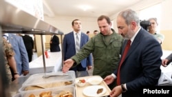 Armenia -- Prime Minister Nikol Pashinian and Defense Minister Davit Tonoyan (second from right) inspect the new canteen of a military base in Armavir, July 19, 2019.