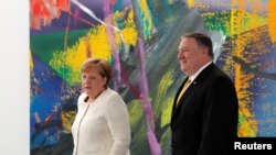 Анґела Меркель і Майкл Помпео під час зустрічі в Берліні 31 травня 2019 року