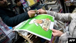 Первый номер Charlie Hebdo, выпущенный после нападения на редакцию
