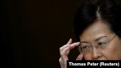 CHINA -- Hong Kong's Chief Executive Carrie Lam gestures during a news conference in Hong Kong, August 13, 2019