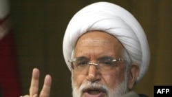 Hossein Karrubi says his father, opposition presidential candidate Mehdi Karrubi (above), talked to parliament about his allegations that opposition protesters have been raped in detention.